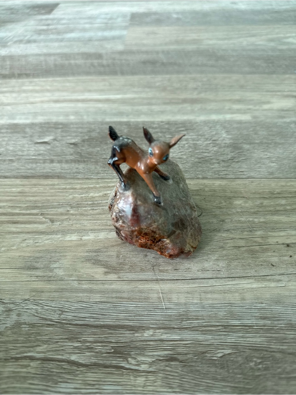 Small Brown Deer Figurine on Natural Rock Accent